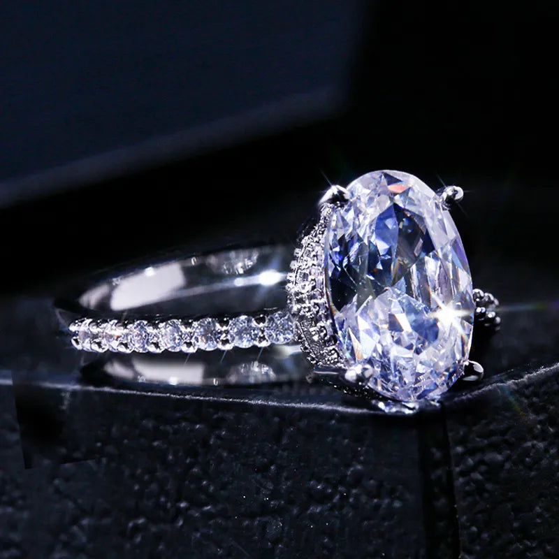 Oval Ring Band Dazzling Brilliant CZ Stone Four Prong Setting Classic